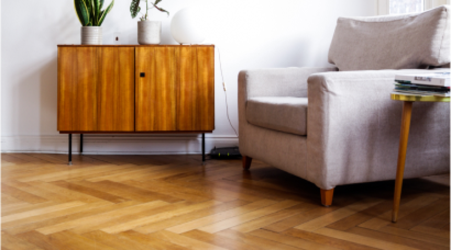 sofa-cuero-mesa-madera-interior-sala-estar-planta-muro-hormigon-tv-representacion-3d 4